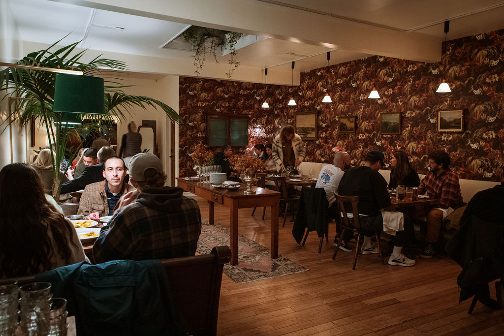 View of the middle dining room with guests