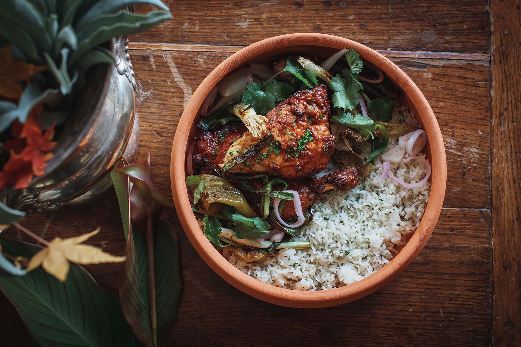 A vase of plants & Tandoori Chicken